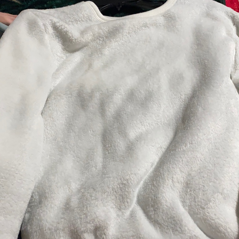 A white sweater kinda thin material